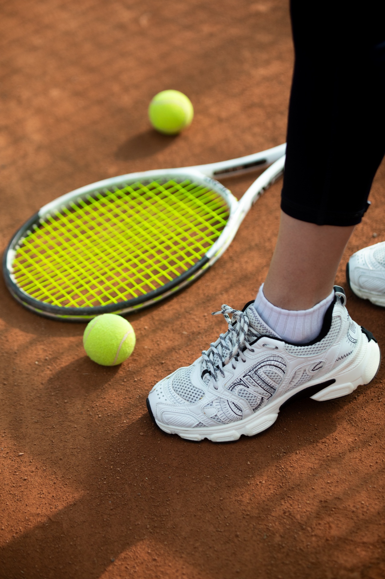 Sneakers on Clay